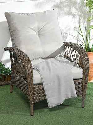luxury with this outdoor couch that features generously padded 4