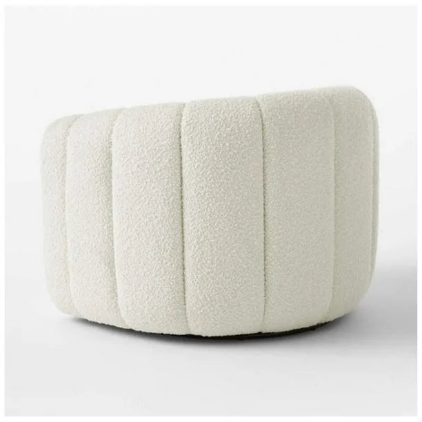 chair made of Boucle fabric and round edges