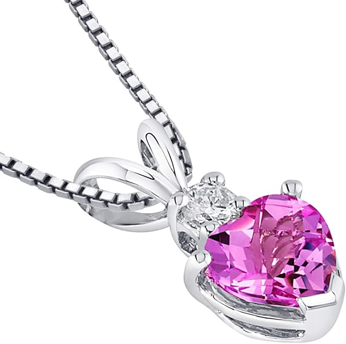 Stone has a flattering checkboard faceting, punctuated with a genuine white Round Brilliant Cut Diamond,