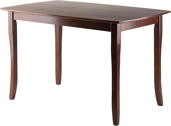 The tabletop has a softly curved profile supported by a solid frame. The contoured, tapered legs give the table, Wood Inglewood Dining Sofa Table
