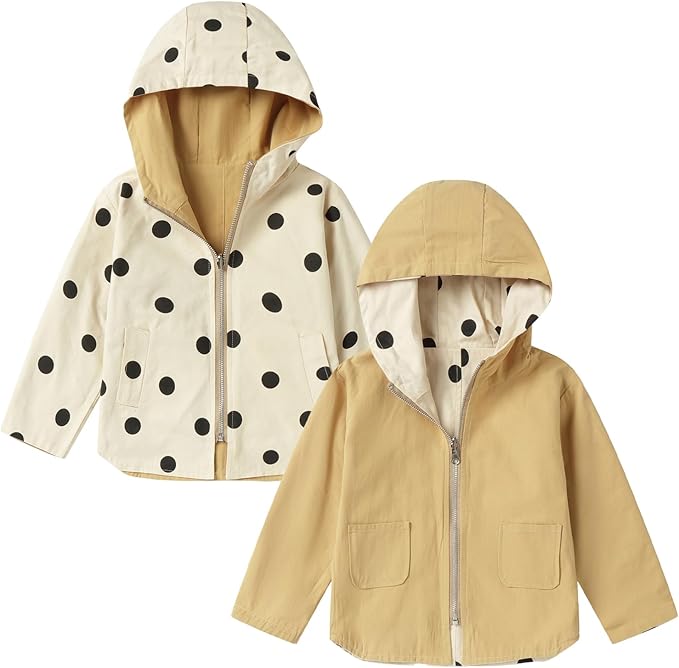 This girls' outerwear jackets offers two looks in one, featuring a playful polka dot pattern on one side and a classic solid color on the other