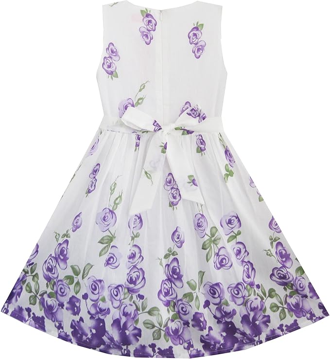 The dress is a sleeveless sundress featuring a white background with a printed green clover pattern. Its classic and simple design makes it versatile for various occasions. Primarily, it's ideal for St Patrick's Day holiday celebrations
