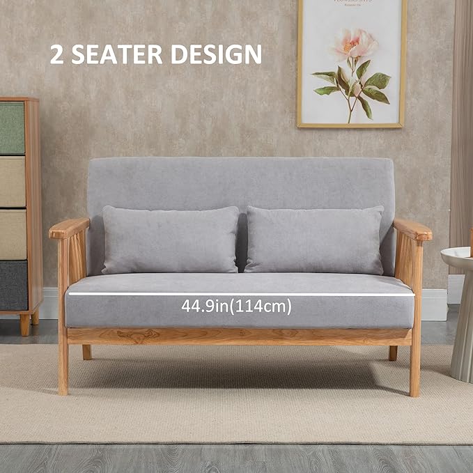 This small couch provides you with softness and support you deserve with its skin-friendly velvet-touch surface, well-padded back cushion, the S spring underneath the seat and 2 extra throw cushions