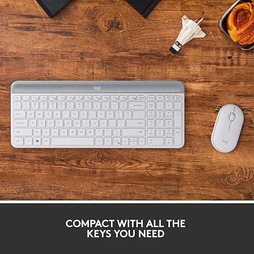 Simple plug-and-play USB nano receiver offers a strong reliable 2.4 GHz wireless connection with 10 m (33ft) of range.  Modern Compact Layout, Ultra Quiet, 2.4 GHz USB Receiver, Plug n' Play Connectivity, Compatible with Windows