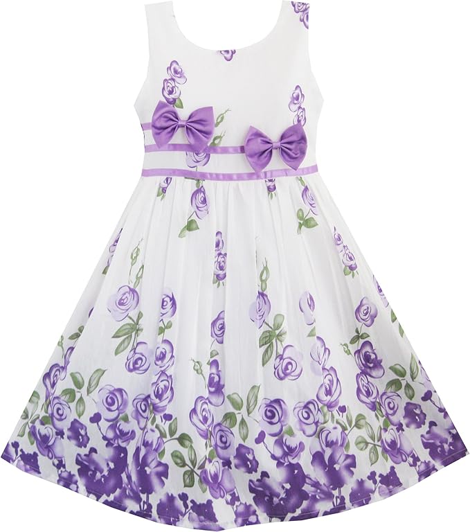 The dress is a sleeveless sundress featuring a white background with a printed green clover pattern. Its classic and simple design makes it versatile for various occasions. Primarily, it's ideal for St Patrick's Day holiday celebrations