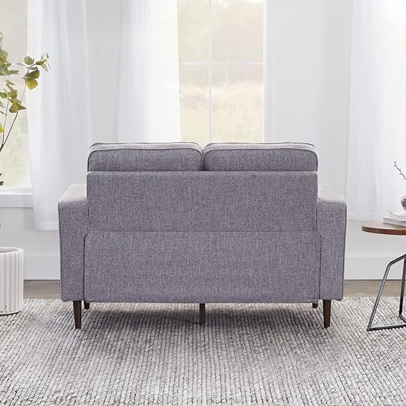 compact size, this sophisticated furniture will instantly elevate your living room or office space with a classy flair and reliable construction
