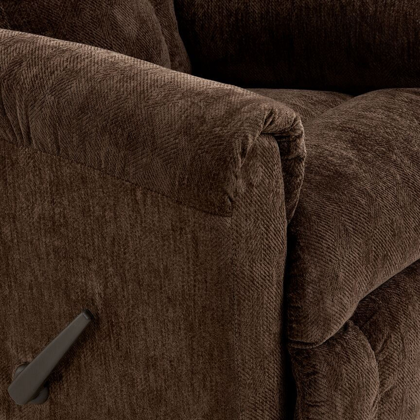 this recliner seamlessly combines style with functionality.Recliner - Brown