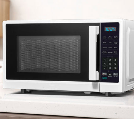 cook includes one to six minutes full power cooking, 0.7 Cu. Ft. Compact Microwave